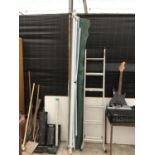 A LARGE WIND OUT AWNING AND A TWELVE RUNG TWO SECTION ALUMINIUM LADDER