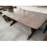 A BELIEVED ERCOL ELM DINING TABLE