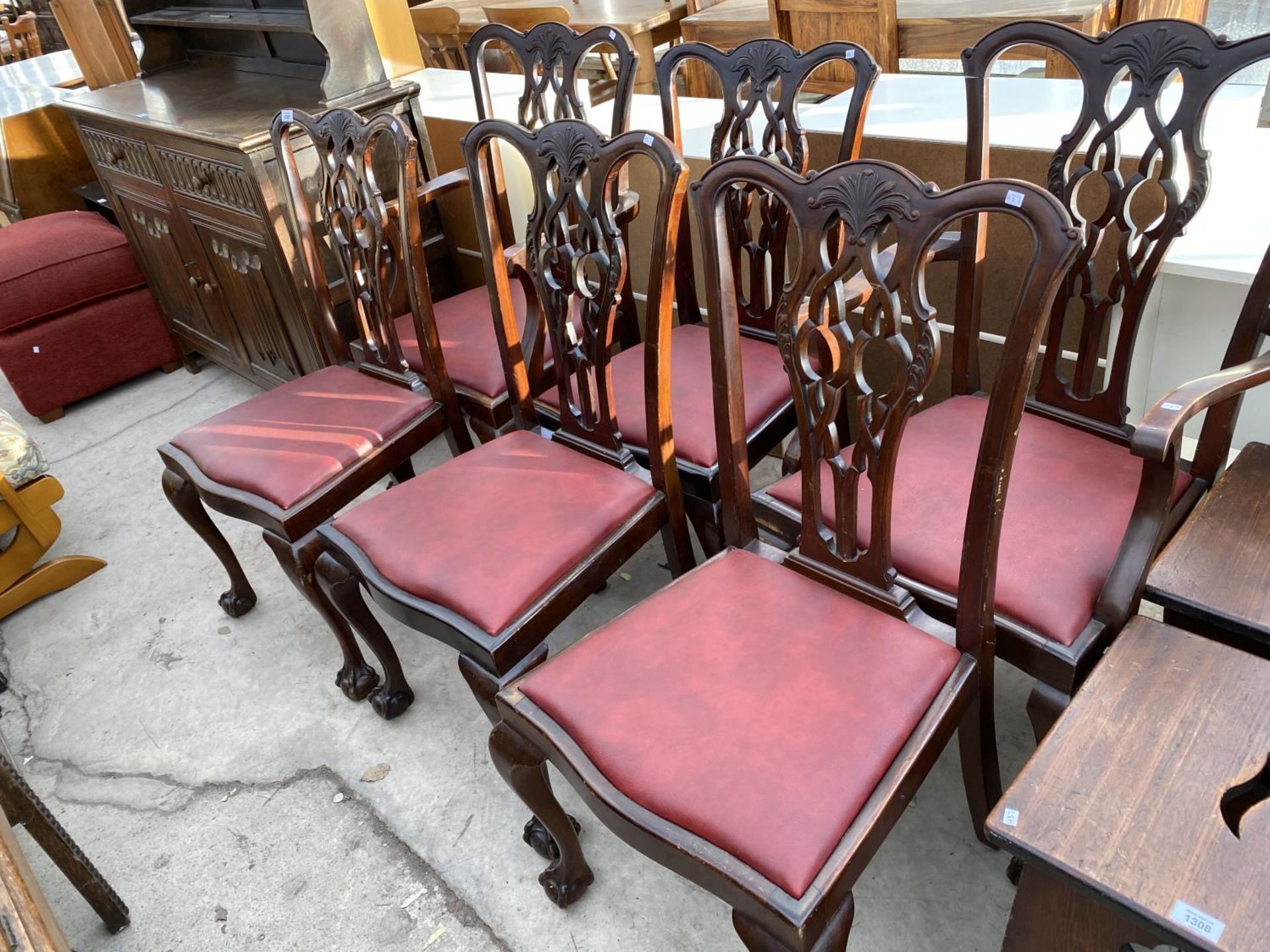 SIX CHIPPENDALE STYLE CARVED MAHOGANY DINING CHAIRS