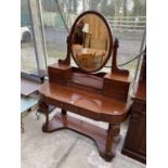 A VICTORIAN MAHOGANY DRESSING TABLE WITH LOWER DRAWER, SEVEN UPPER DRAWERS AND BEVEL EDGE MIRROR