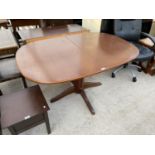 A MAHOGANY EXTENDING DINING TABLE