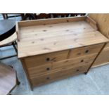 A PINE CHEST OF TWO SHORT AND TWO LONG DRAWERS