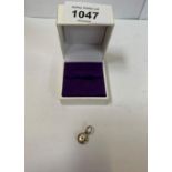 A BOXED SILVER FOB