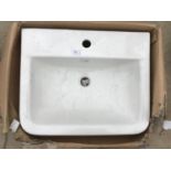 AN AS NEW AND BOXED WHITE VICTORIA PLUMB WASH BASIN 550 BAS1004