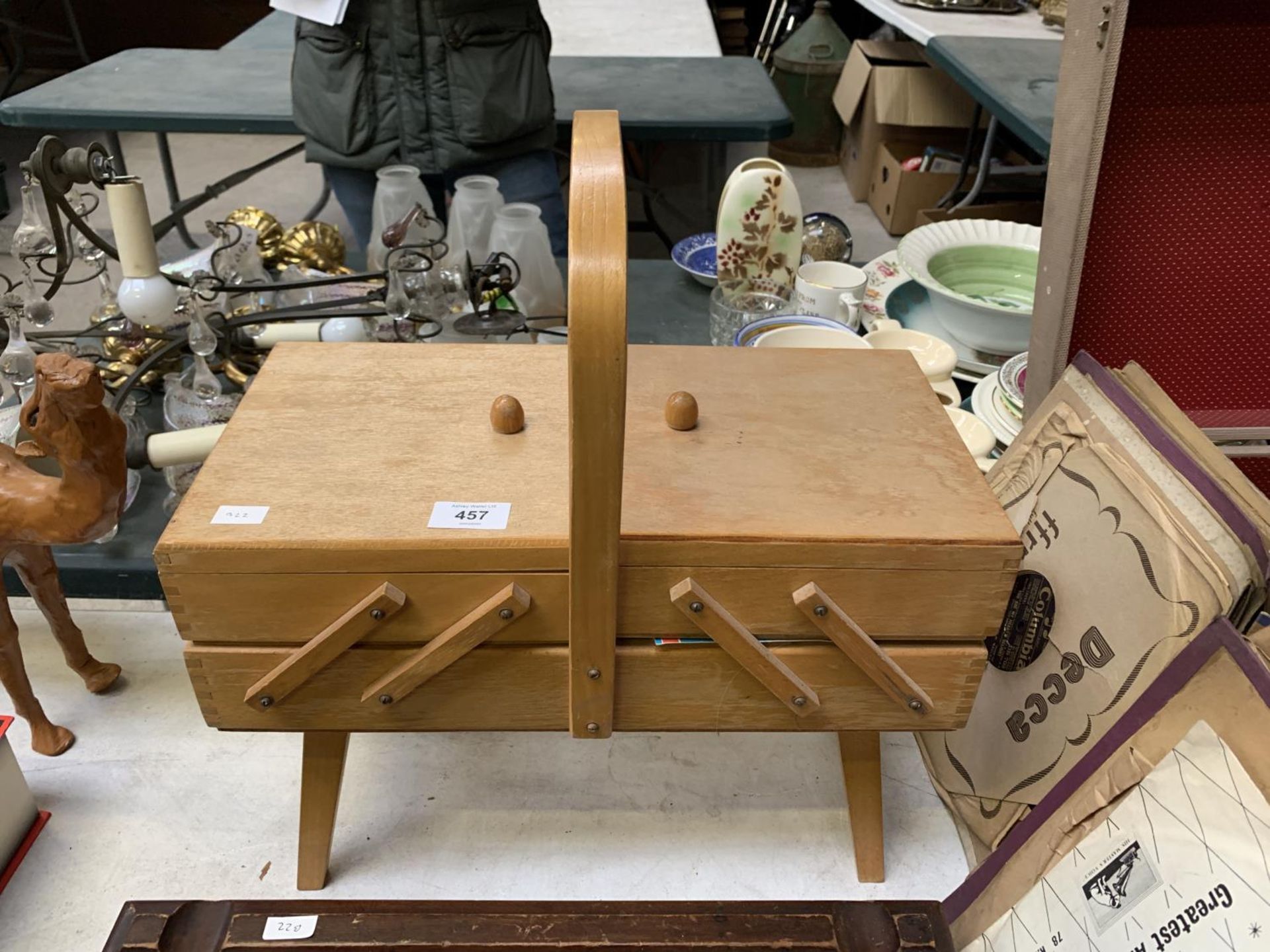 A WOODEN SEWING BOX AND CONTENTS