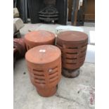 THREE TERRACOTTA CHIMNEY POT TOPS