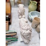 A PAIR OF HEAVY RESIN TYPE LION MODELS