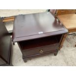 A STAG MINSTREL MAHOGANY BEDSIDE CABINET