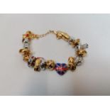 A BRADFORD EXCHANGE CHARM BRACELET