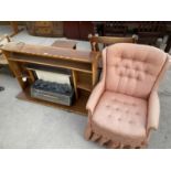 A MAHOGANY FIRE SURROUND WITH ELECTRIC FIRE AND A PINK BUTTON BACK BEDROOM CHAIR