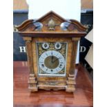 A CIRCA 1890 WALNUT BRACKET CLOCK BY LENZKIRCH, GERMANY, HAVING EIGHT DAY MOVEMENT WITH STRIKING AND