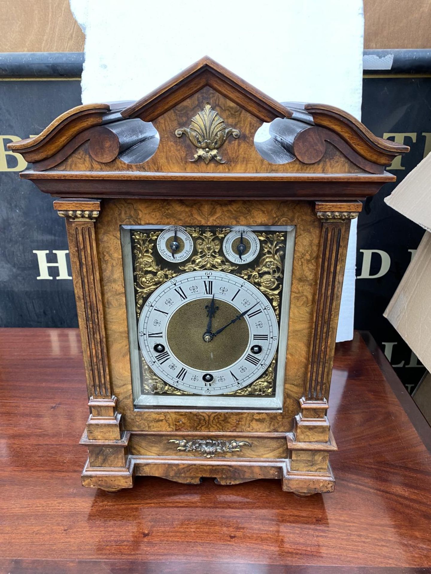 A CIRCA 1890 WALNUT BRACKET CLOCK BY LENZKIRCH, GERMANY, HAVING EIGHT DAY MOVEMENT WITH STRIKING AND