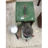 A VINTAGE CAMPING STOVE IN A WOODEN CARRY CASE WITH PAN