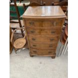 A WALNUT CHEST OF FIVE DRAWERS