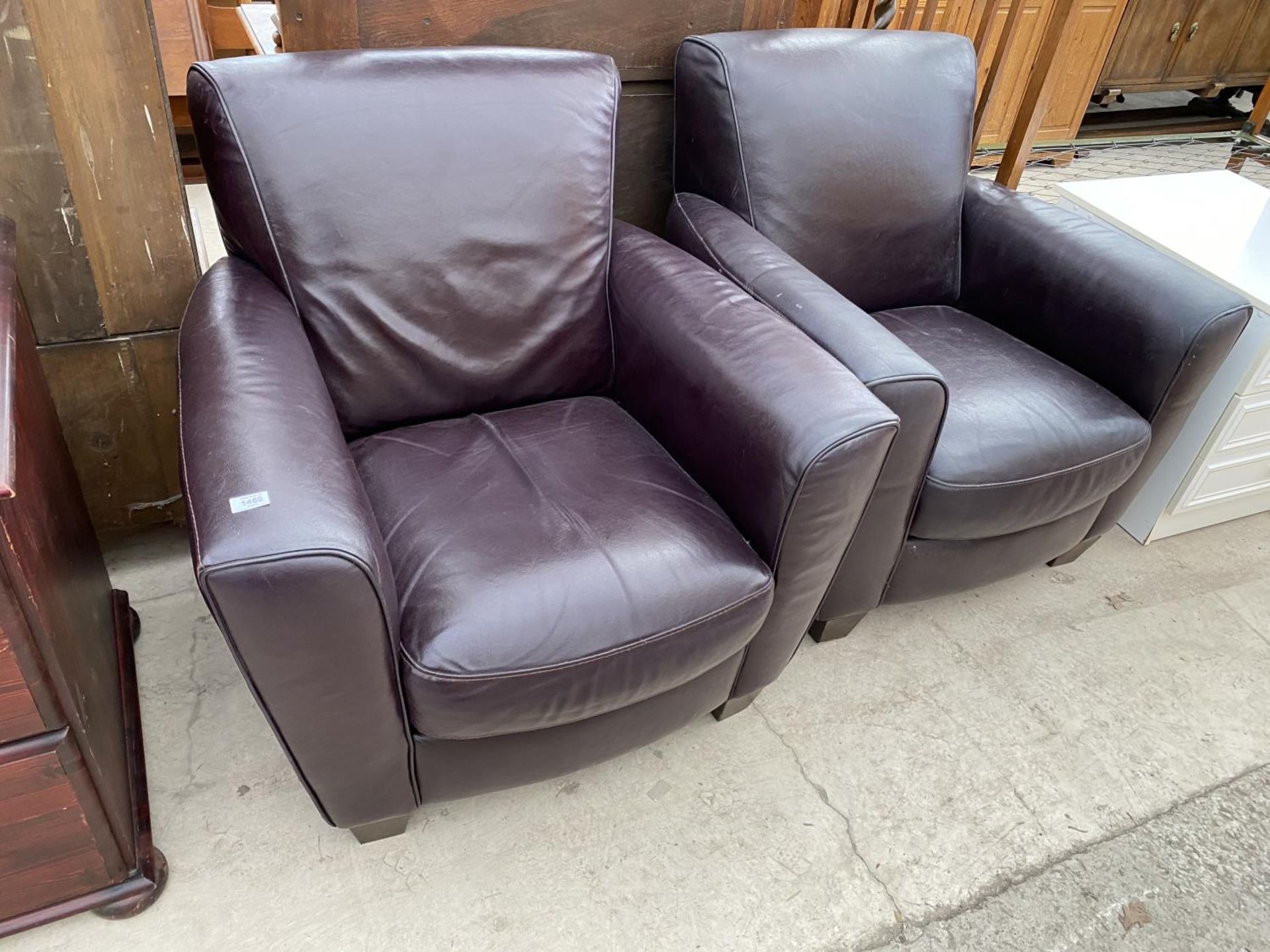TWO LEATHER ARMCHAIRS