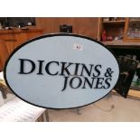 A VINTAGE DICKINS & JONES SHOP SIGN