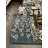 A COLLECTION OF MIXED GLASSWARE AND FLATWARE
