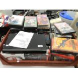 A LARGE QUANTITY OF DVDS, VIDEOS ETC AND A DVD PLAYER IN WORKING ORDER