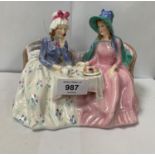 A ROYAL DOULTON 'AFTERNOON TEA' CERAMIC FIGURE