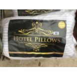 FOUR PACKS OF NEW HOTEL PILLOWS (TWO PILLOWS PER PACK) RRP £29.99 PER PACK