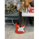 A FENDER SQUIRE STRAT RED ELECTRIC GUITAR