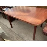 A MAHOGANY EXTENDING DINING TABLE