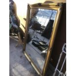 A LARGE ORNATE GILT FRAMED MIRROR 140CM X 110CM