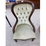 A BUTTON BACKED MAHOGANY NURSING CHAIR