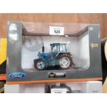 A BOXED DIE CAST UNIVERSAL HOBBIES FORD 7610 GEN 3 4WD TRACTOR MODEL, REF NO. 4140