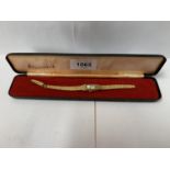 A LADIES GOLD PLATED ACCURIST BOXED WRIST WATCH