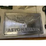 A CHROME ASTON MARTIN SIGN