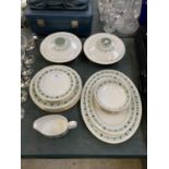 A ROYAL DOULTON PART DINNER SERVICE TO INCLUDE TWO TUREENS, MEAT DISHES, PLATES ETC