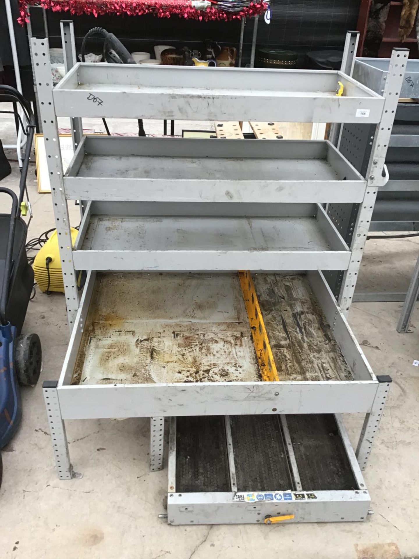 A METAL RACKING FOUR SHELF STORAGE UNIT WITH WHEELED UNDER STORAGE TRAY - Image 2 of 2