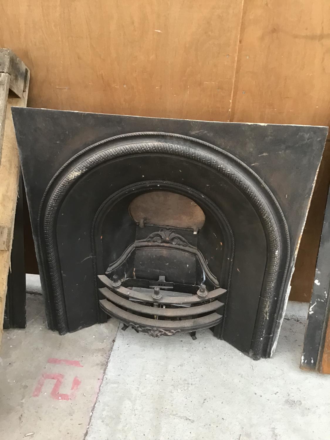 A CAST IRON FIRE PLACE WITH GRATE 91CM X 90CM HIGH