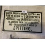 A CAST IRON 'PREVENTION OF CONSUMPTION' SIGN