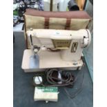 A VINTAGE SINGER SEWING MACHINE WITH CASE, PEDAL AND ATTACHMENTS