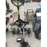 A BATTERY OPERATED HILL BILLY GOLF TROLLEY WITH CHARGER IN WORKING ORDER