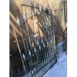 A PAIR OF VERY ORNATE WROUGHT IRON GATES 95CM X 149CM HIGH