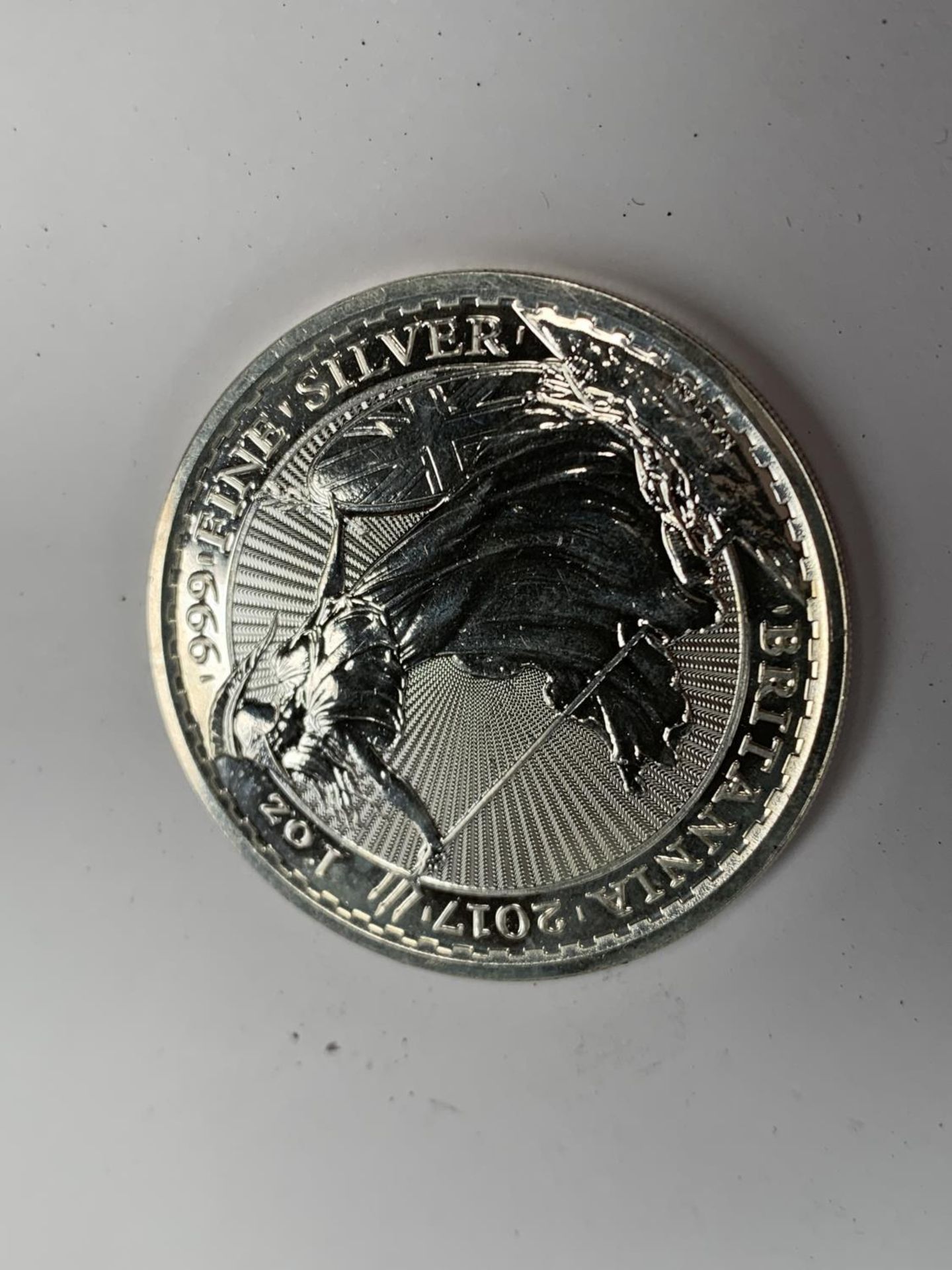 A SILVER 1 OZ BRITANNIA COIN