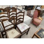 NINE ITEMS - THREE OAK LADDER BACK DINING CHAIRS, A MAHOGANY BEDROOM CHAIR, AN OTTOMAN, THREE