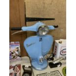 A LARGE BLUE VESPA LAMP