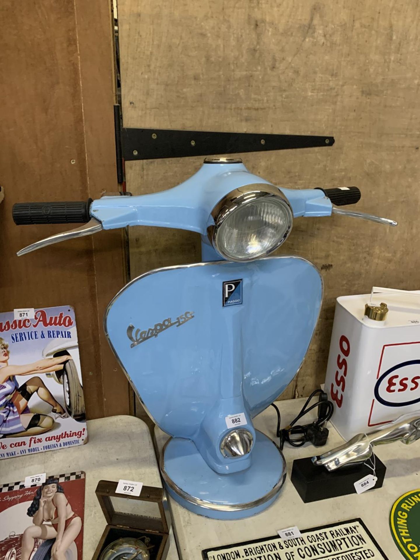 A LARGE BLUE VESPA LAMP