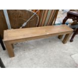 A LONG PINE BENCH SEAT