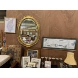 A LARGE LOT OF FRAMED PICTURES, MAPS AND PRINTS TOGETHER WITH A OVAL MIRROR