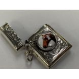 A SILVER VESTA CASE WITH PAINTED ENAMEL HORSE DESIGN