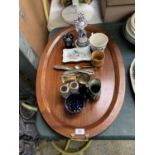 A WOODEN TRAY WITH ASSORTED CERAMICS AND METAL WARES
