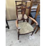 AN INLAID MAHOGANY CARVER DINING CHAIR AND AN OAK DINING CHAIR WITH RUSH SEAT