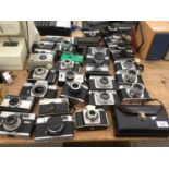 A LARGE COLLECTION OF VARIOUS CAMERAS TO INCLUDE KODAK, PRAKTIA, ILFORD ETC