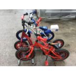 TWO CHILDRENS BIKES TO INCLUDE A LIGHTENING MCQUEEN, POLICE AND A SCOOTER