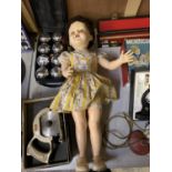 A 1950'S PLASTIC CHILDREN'S DOLL